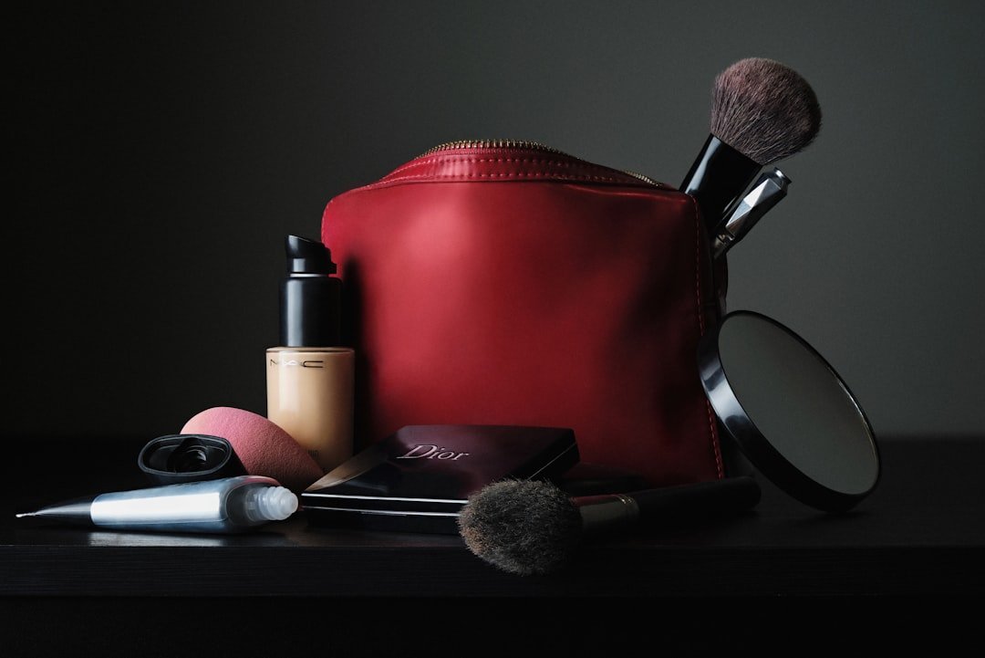 Makeup bag and beauty products arranged for a restock review