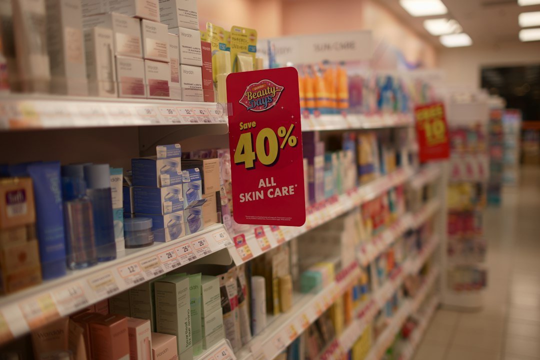 Skincare products on shelves with a 40% off sale sign
